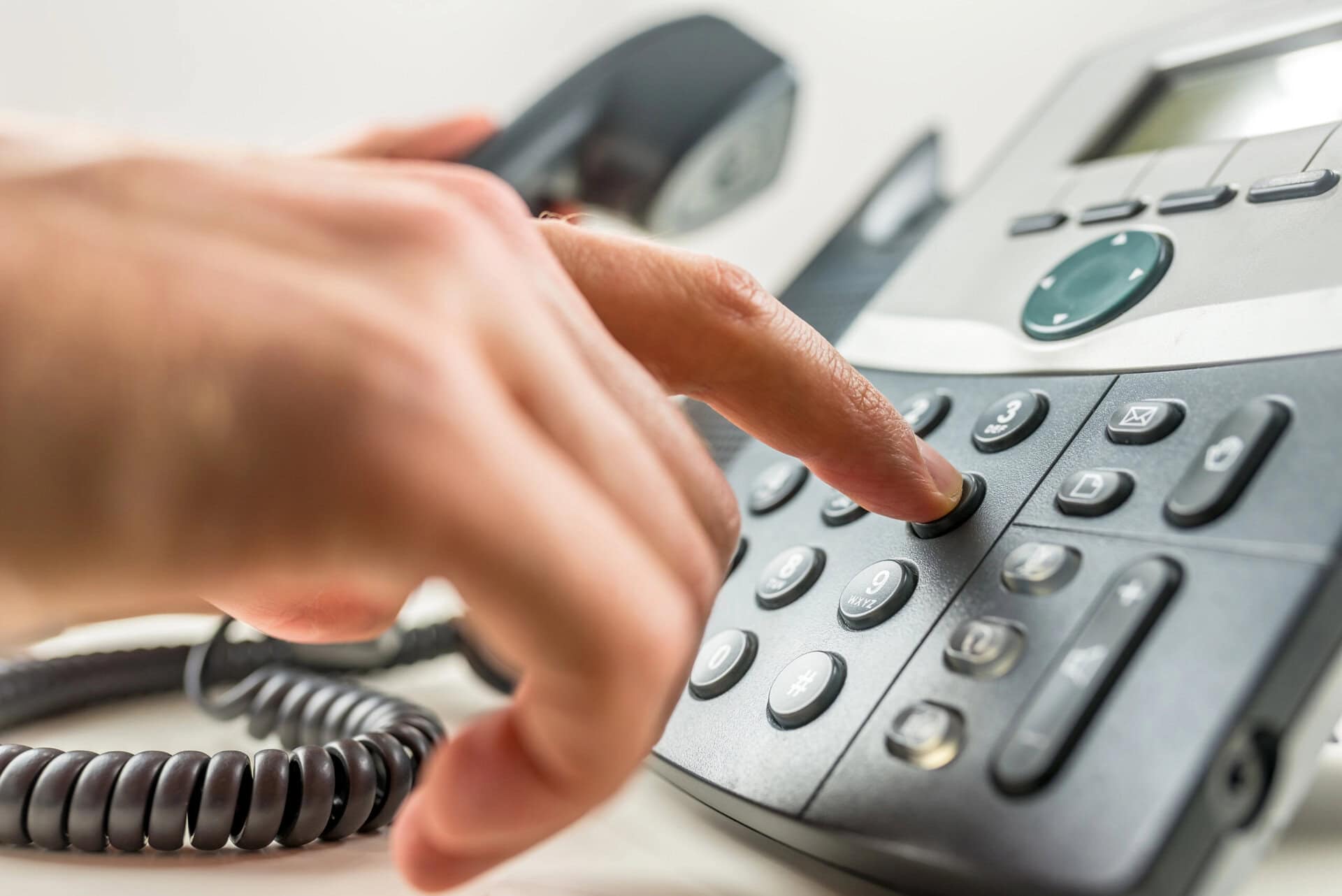 Photo of a person making a phone call